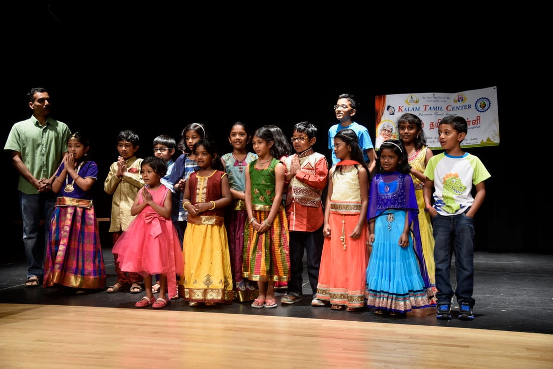 Kalam Tamil Center students performing on stage